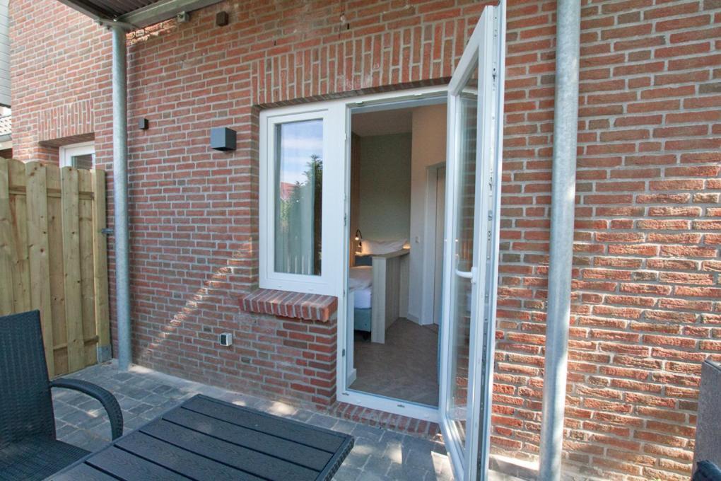 Hotel Garni Goldener Anker Greetsiel Exterior foto